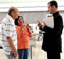 Visiting priest signs Mass for diocese's Deaf community 