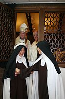 Discalced Carmelite nun professes final vows during veiling ceremony at Holladay monastery