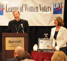 During luncheon, Archbishop Wester shares his personal reflections on immigration