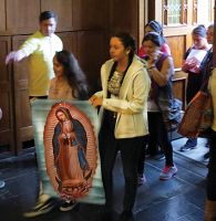 Pilgrimages bring local Catholics to the Cathedral of the Madeleine's Holy Door