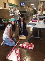 Playing Santa for family in need brings home the true meaning of Christmas to Saint Joseph CHS students