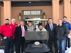 Donated golf cart benefits veterans at Fisher House