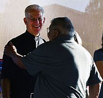 Parishes celebrate retiring priests/ Msgr. Robert Bussen
