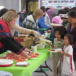 Refugees celebrate the holidays with the help of volunteers and Catholic Community Services