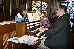 Music creates an atmosphere of praise during a Catholic ceremony