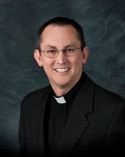 Father John Evans is headed for new assignment at St. Thomas More Parish