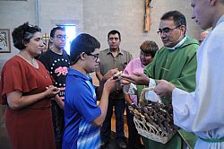 Catholics Can Mass celebrated at St. Thomas Aquinas Parish