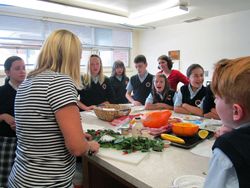 Cooking lesson in the classroom transforms student-grown veggies