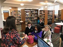 L. S. Skaggs Library Attracts Large Groups of Madeleine Choir School Students at Recess
