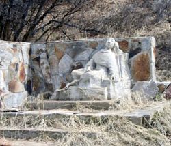 Stone monk in the foothills marks hermitage site