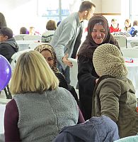 Refugees celebrate the holidays with the help of volunteers and Catholic Community Services