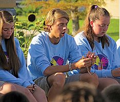 Catholic students pray the rosary for the Bishop's Synod