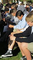 Catholic students pray the rosary for the Bishop's Synod