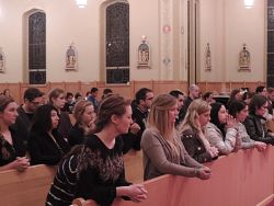 Mass Mob crowds Our Lady of Lourdes Parish pews