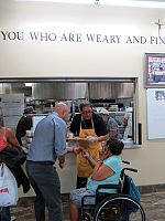 Bishop Solis serves the hungry