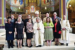Deacon candidates prepare to be installed as lectors during rite at Cathedral of the Madeleine