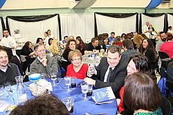 Familiar faces reunite at St. Francis Xavier annual auction
