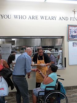 Bishop Solis serves the hungry