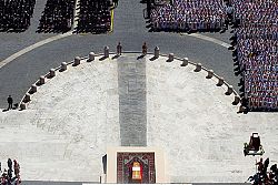 Poor and powerful pray for eternal repose of a pope with an open heart