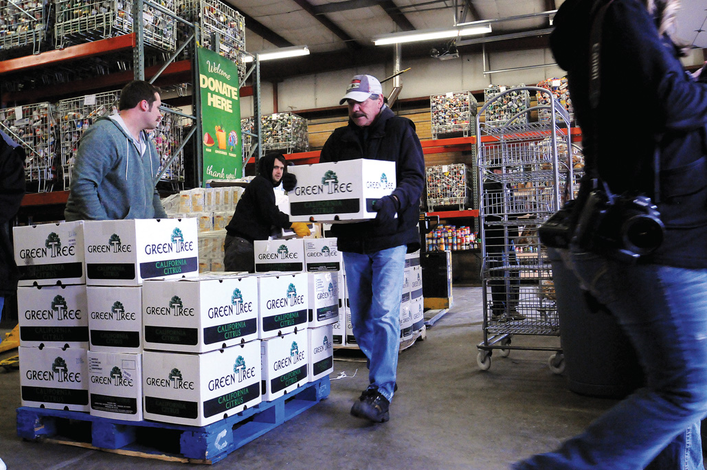 Donation fills shelves at northern Utah food bank - Intermountain Catholic